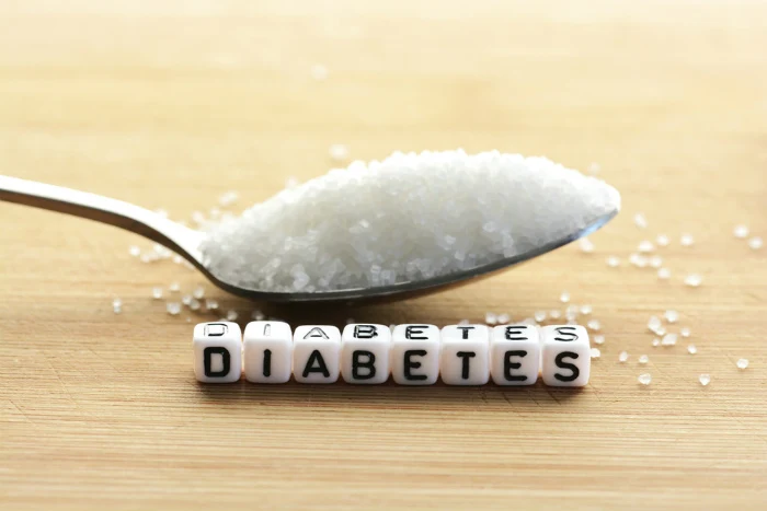 Spoon with sugar and word diabetes