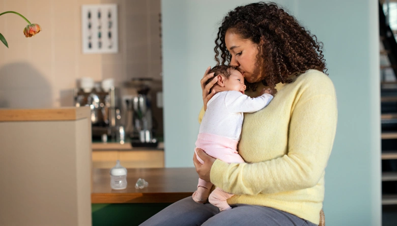 Mother breastfeeding baby