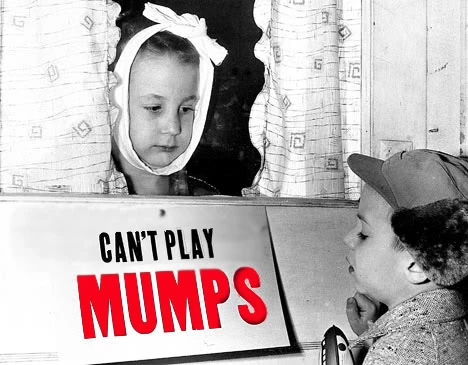 Child with mumps and sign