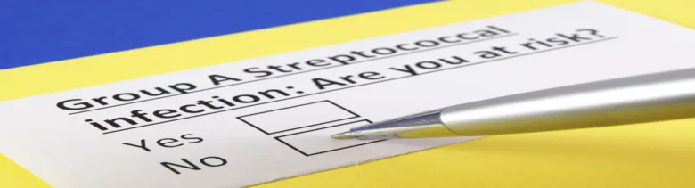 Průzkumník rizika infekce streptokokem skupiny A s tužkou.