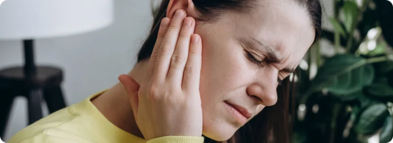 Woman with ear pain