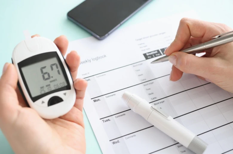 Glucose meter and logbook